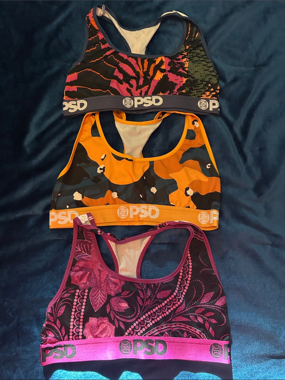PSD Racerback Sports Bra Trio in Black, Orange, Pink